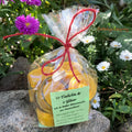 Geschenkset mit 10 Bienenwachs Teelichtern + 2 Gläsern